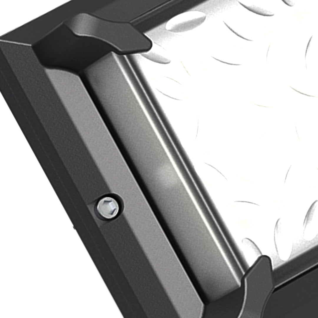 Detailed view of the robust Black Outdoor Wall Light showcasing the unique diamond-plate textured reflector inside the frame.