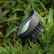 Robust black LED spotlight with advanced heat management fins and adjustable mounting system