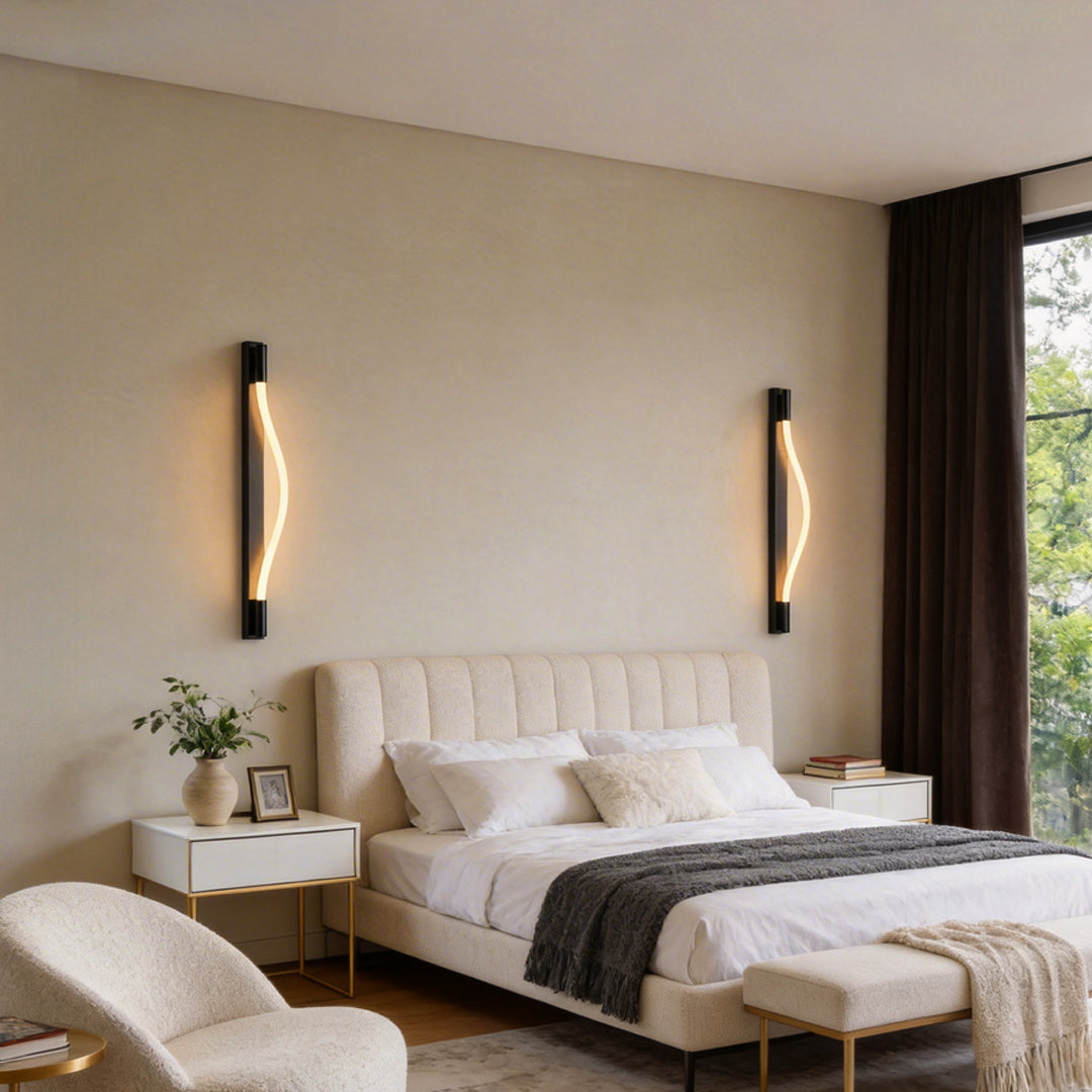 Rope wall sconce light with a sleek black frame, enhancing a cozy bedroom setting.