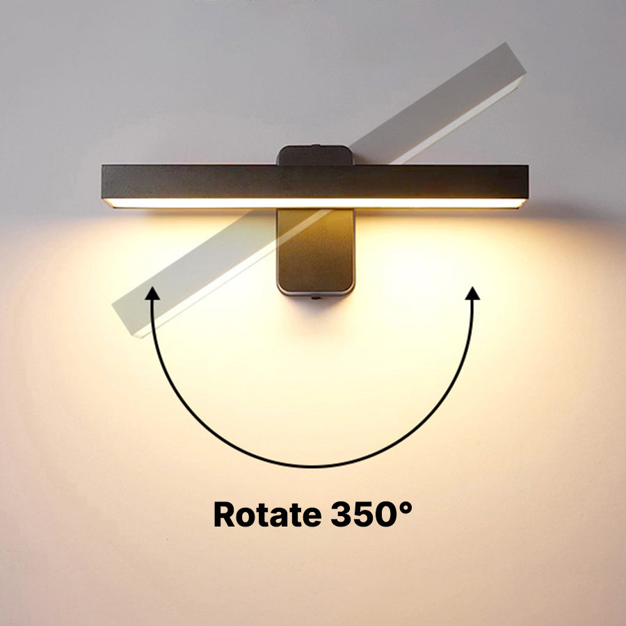 Contemporary wall sconce with rotatable feature showing 360-degree adjustment capability