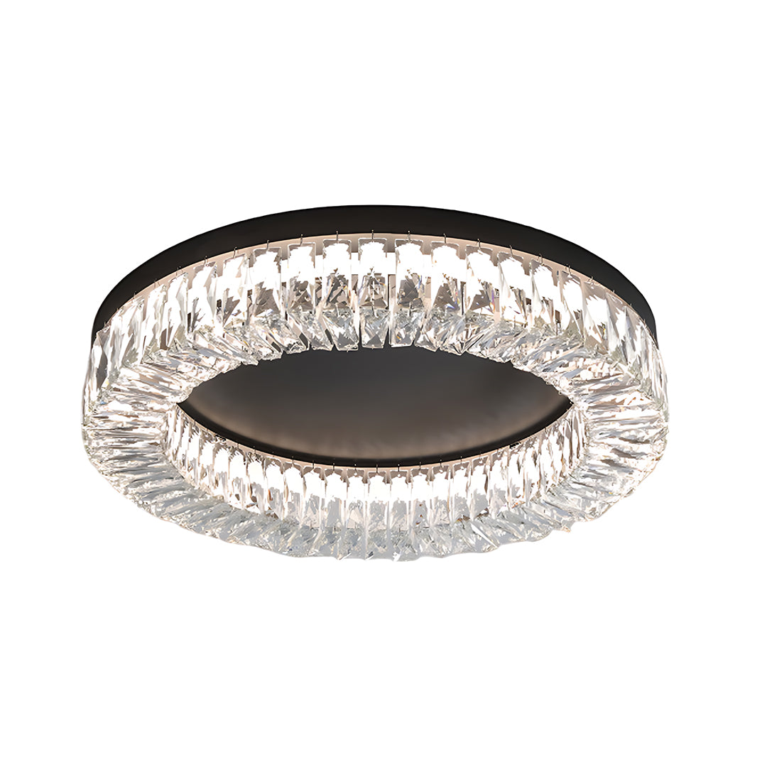 Round black ceiling flush mount light with ring of faceted crystal glass elements surrounding dark center.
