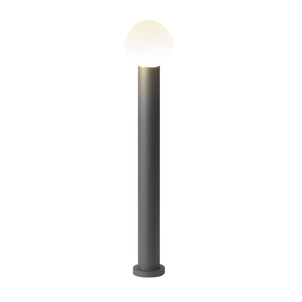 Round bollard lights with a close up of their base and spherical head.