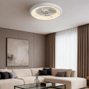 Round ceiling fan with light illuminating a modern living room with a beige sofa and curtains.