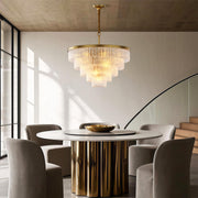 Modern luxury chandeliers inspired round modern chandelier above dining table with black chairs