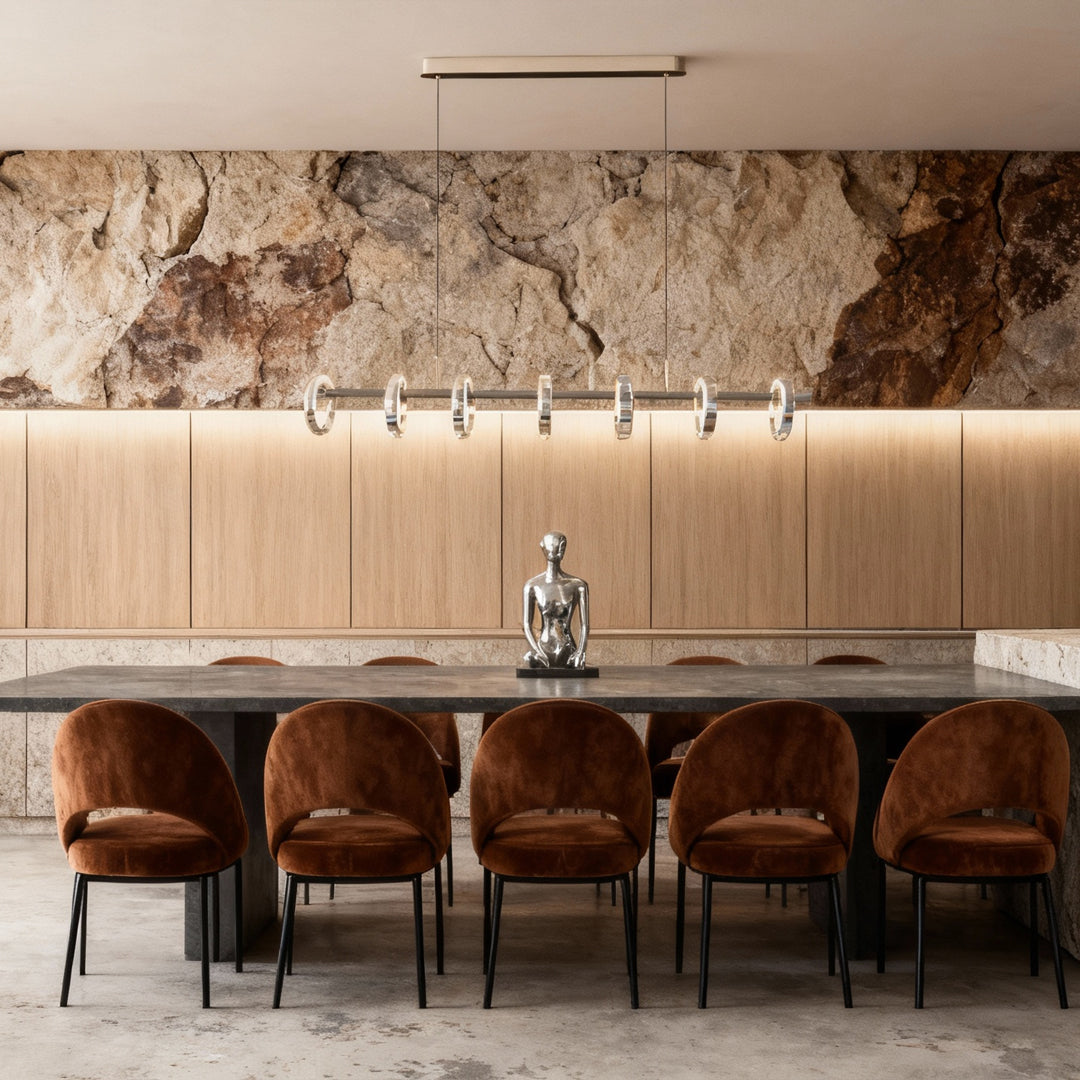 Warm dining space with a sleek round chandelier modern linear design featuring circular ring lights.
