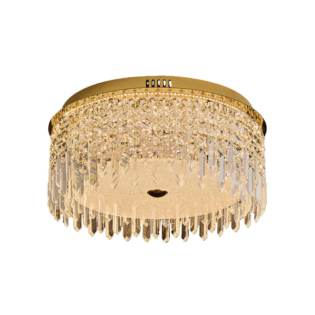 Round flush mount ceiling light with gold frame and hanging crystal drops.