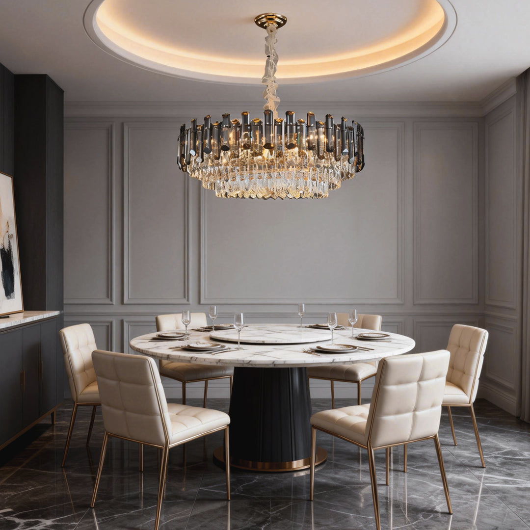 Round drum crystal chandelier illuminating a round dining table, creating a sophisticated dining atmosphere.
