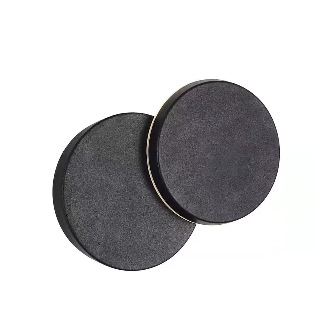 Round dual-disc outdoor lighting sconce in a matte dark finish, designed for contemporary exterior spaces.