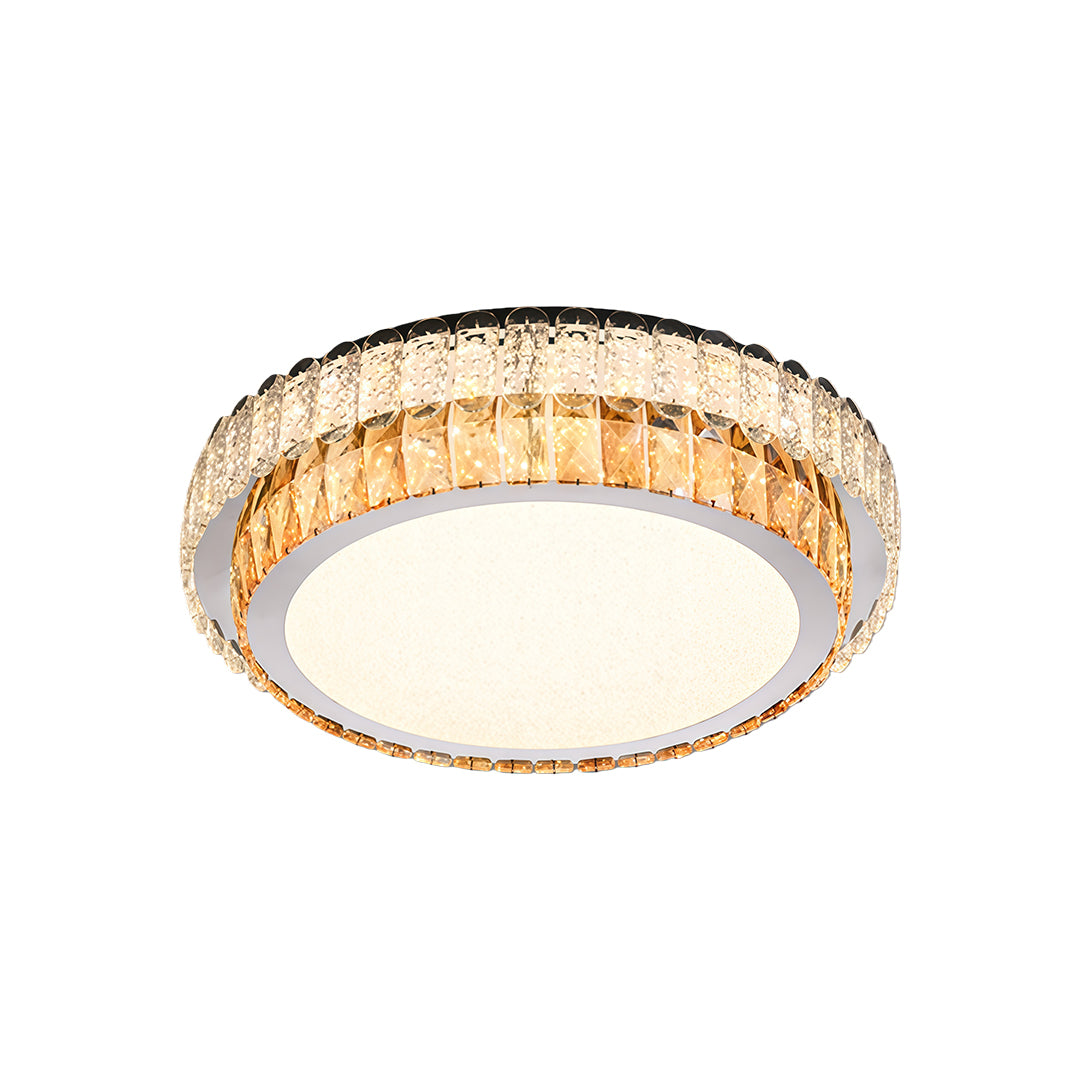 Contemporary round flush mount ceiling light with gold and crystal trim.