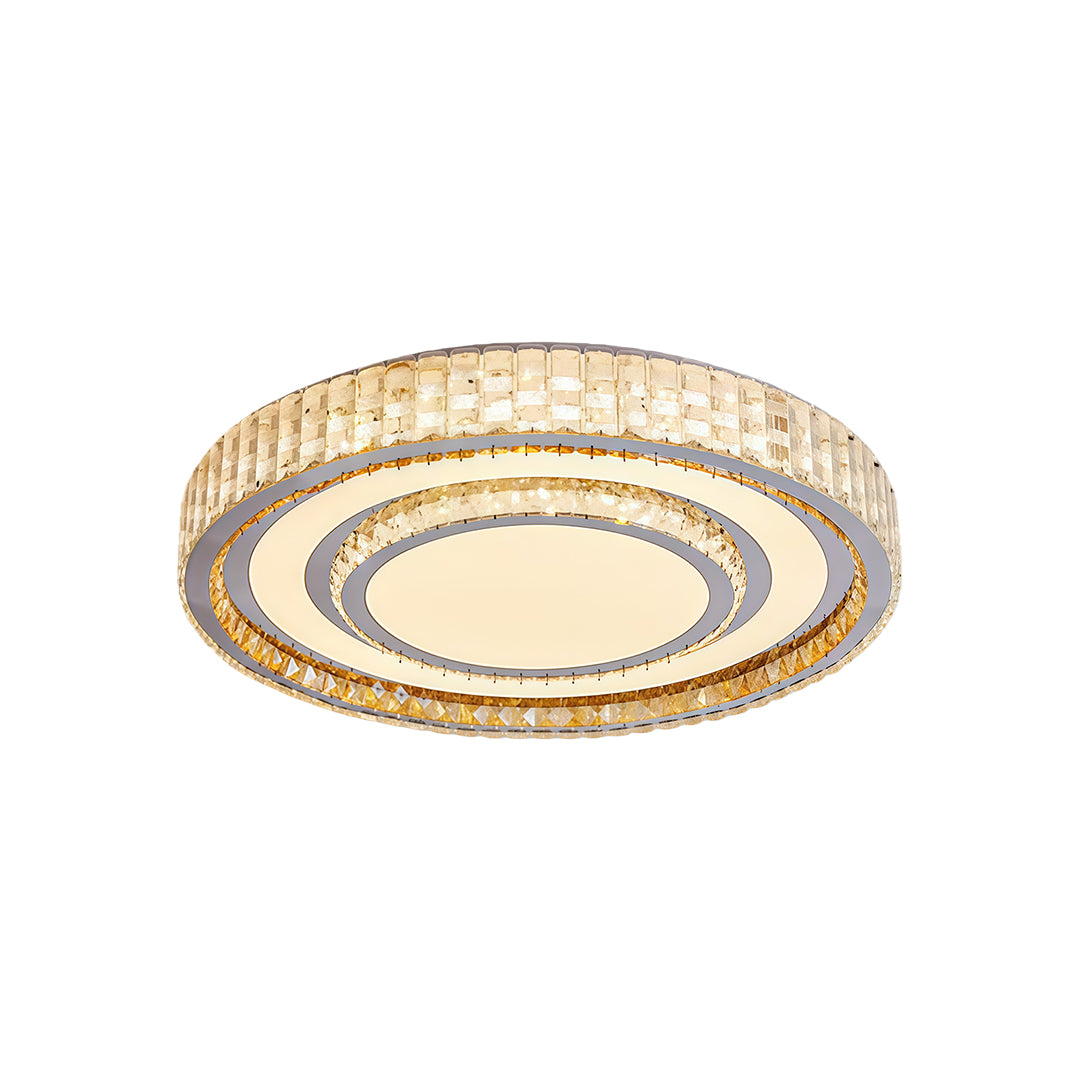 Round flush mount LED ceiling light with crystal trim and golden accent.
