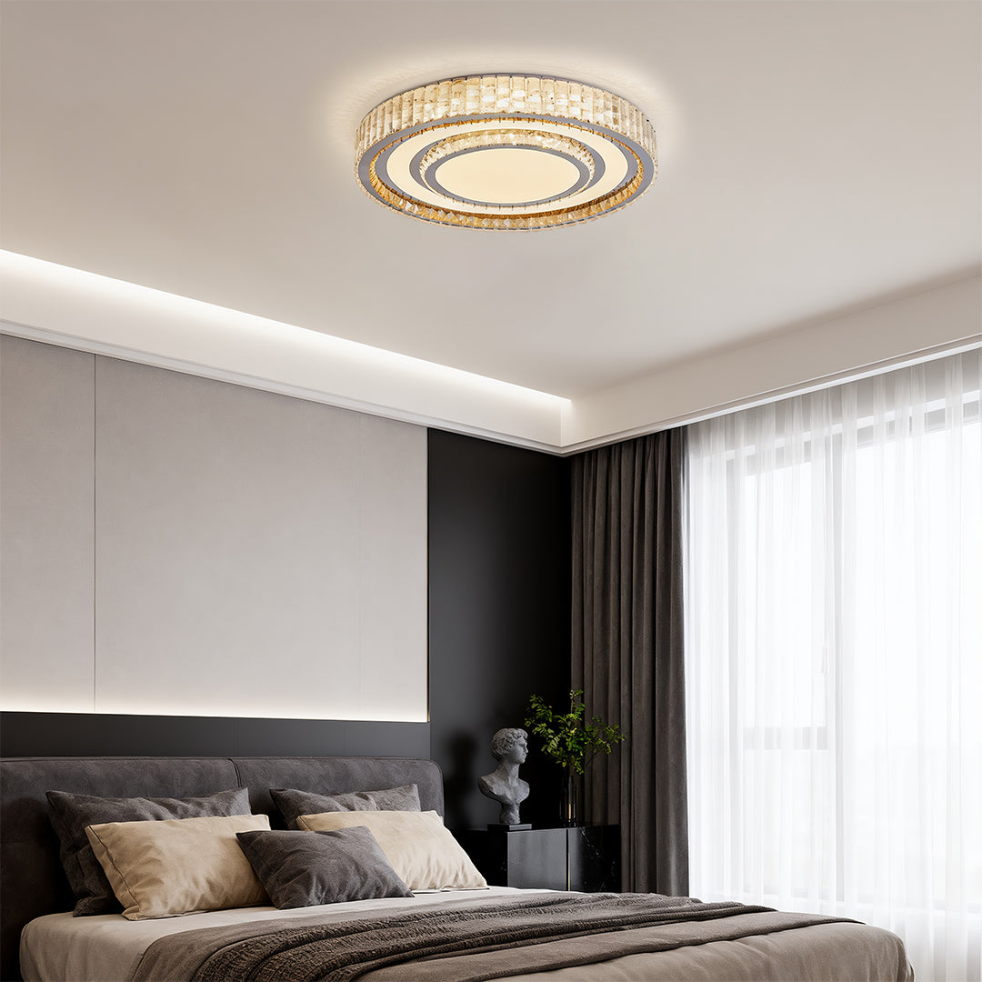 Round flush mount LED light fixtures installed in a modern bedroom.