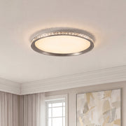 Modern round flush mount led lights with a silver frame and a sparkling crystal textured ring.