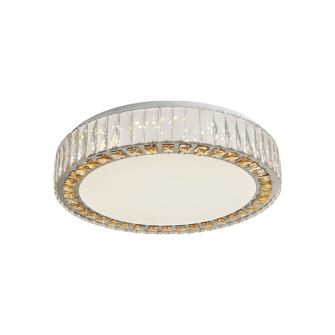 Round crystal ceiling light with golden trim and soft frosted diffuser, ideal for modern interiors.