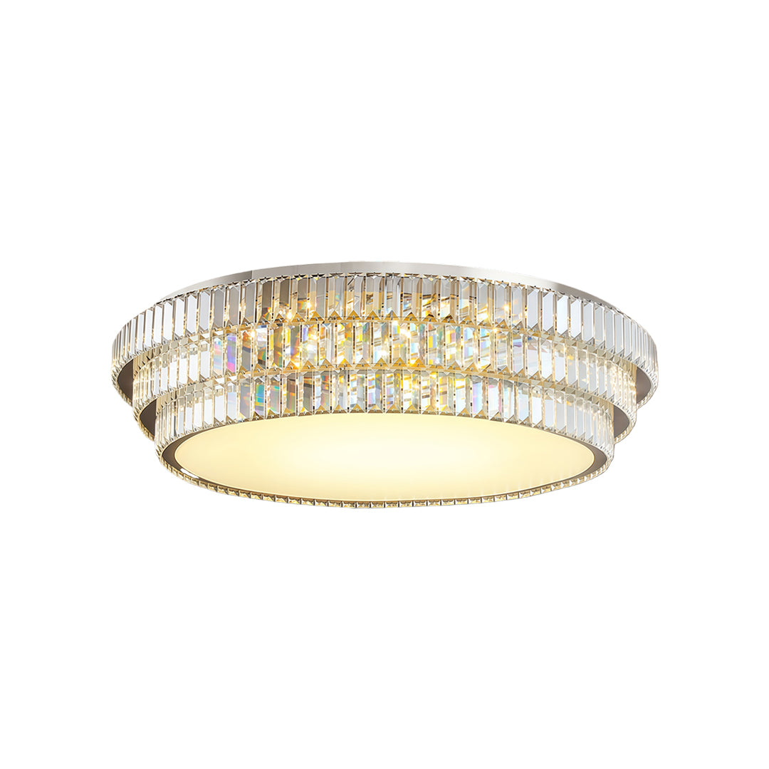Round LED flush mount light with gold and crystal frame.