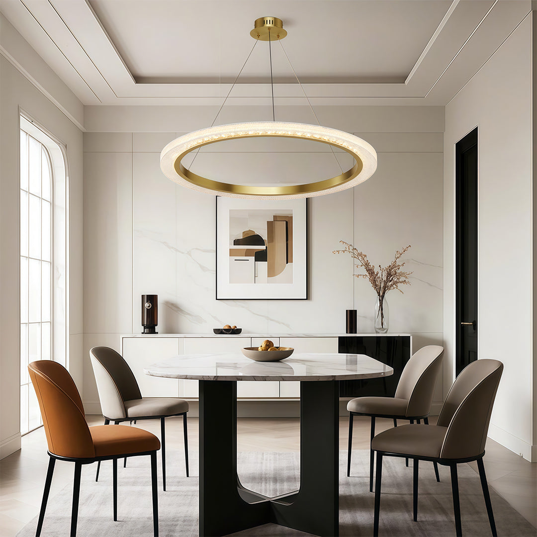 Modern luxury chandeliers illuminating bright dining room with large windows and upholstered seating