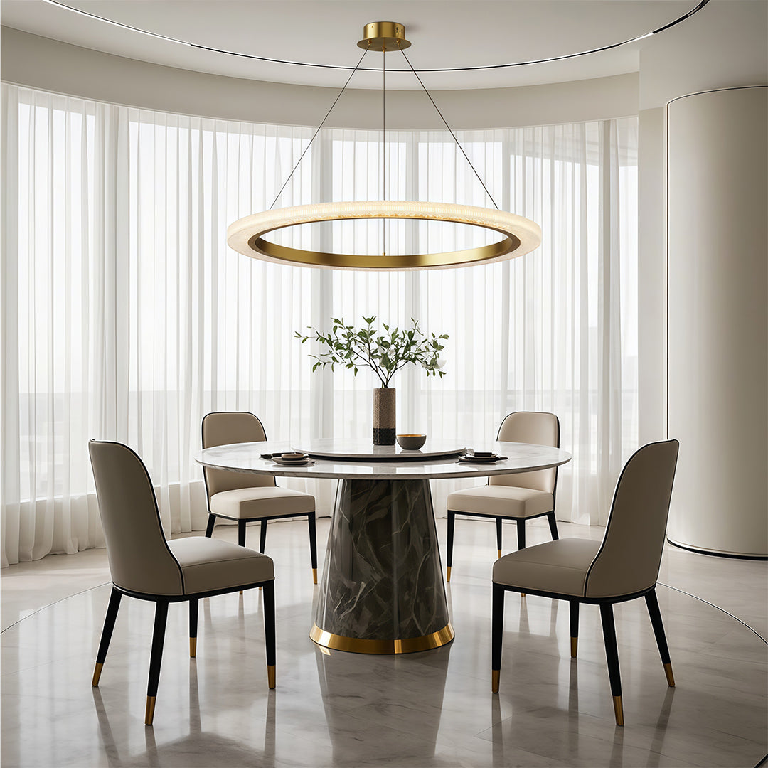 Round modern chandelier lighting serene dining room with sheer curtains and round table