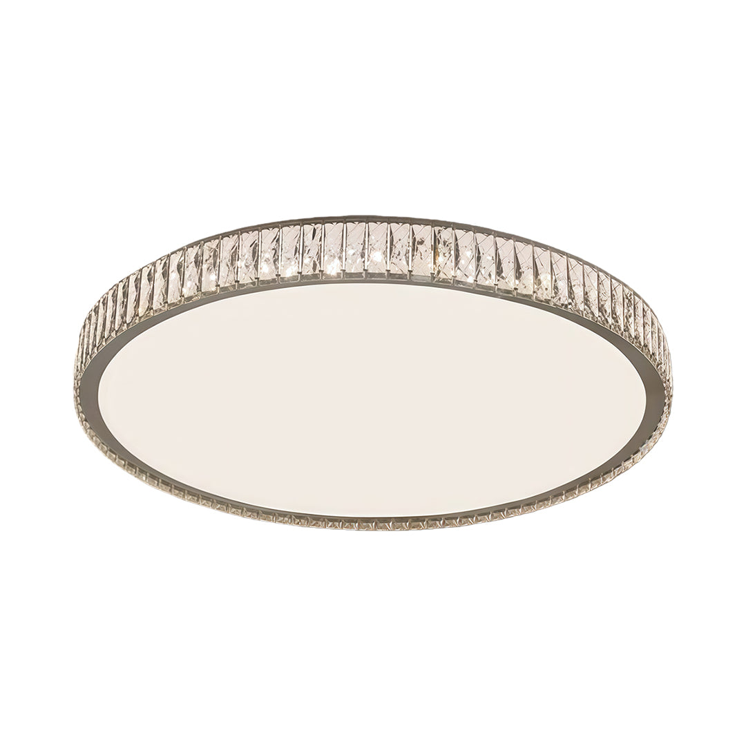 Round modern crystal flush mount lighting fixture with sparkling crystal rim and sleek chrome frame.