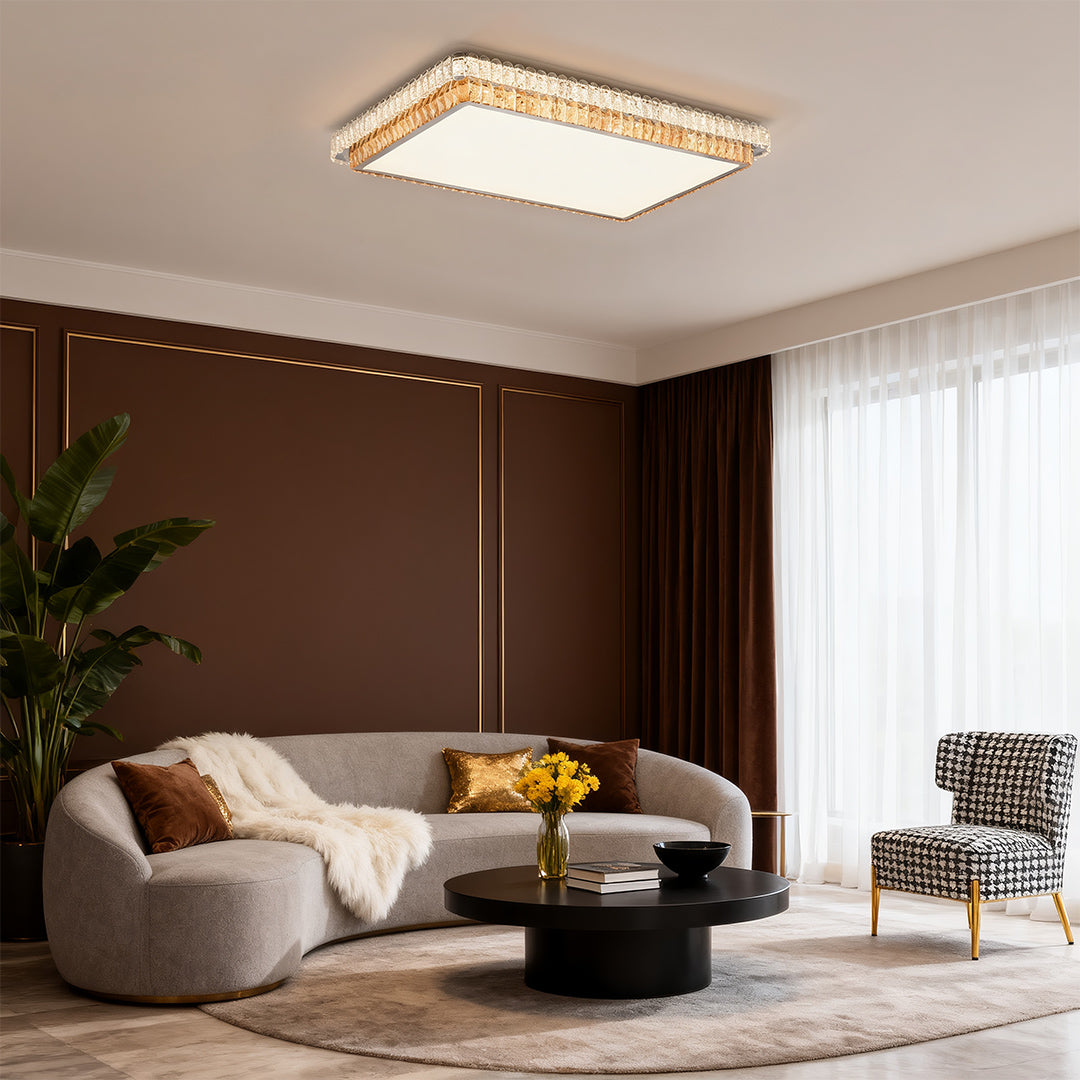 Round modern flush mount ceiling light with gold crystal rim in a bedroom.