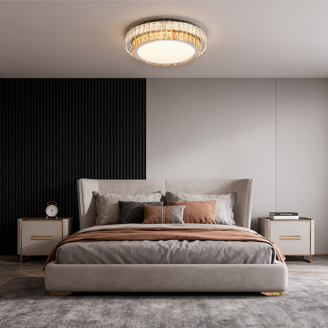 Round modern flush mount ceiling light illuminating a living room.