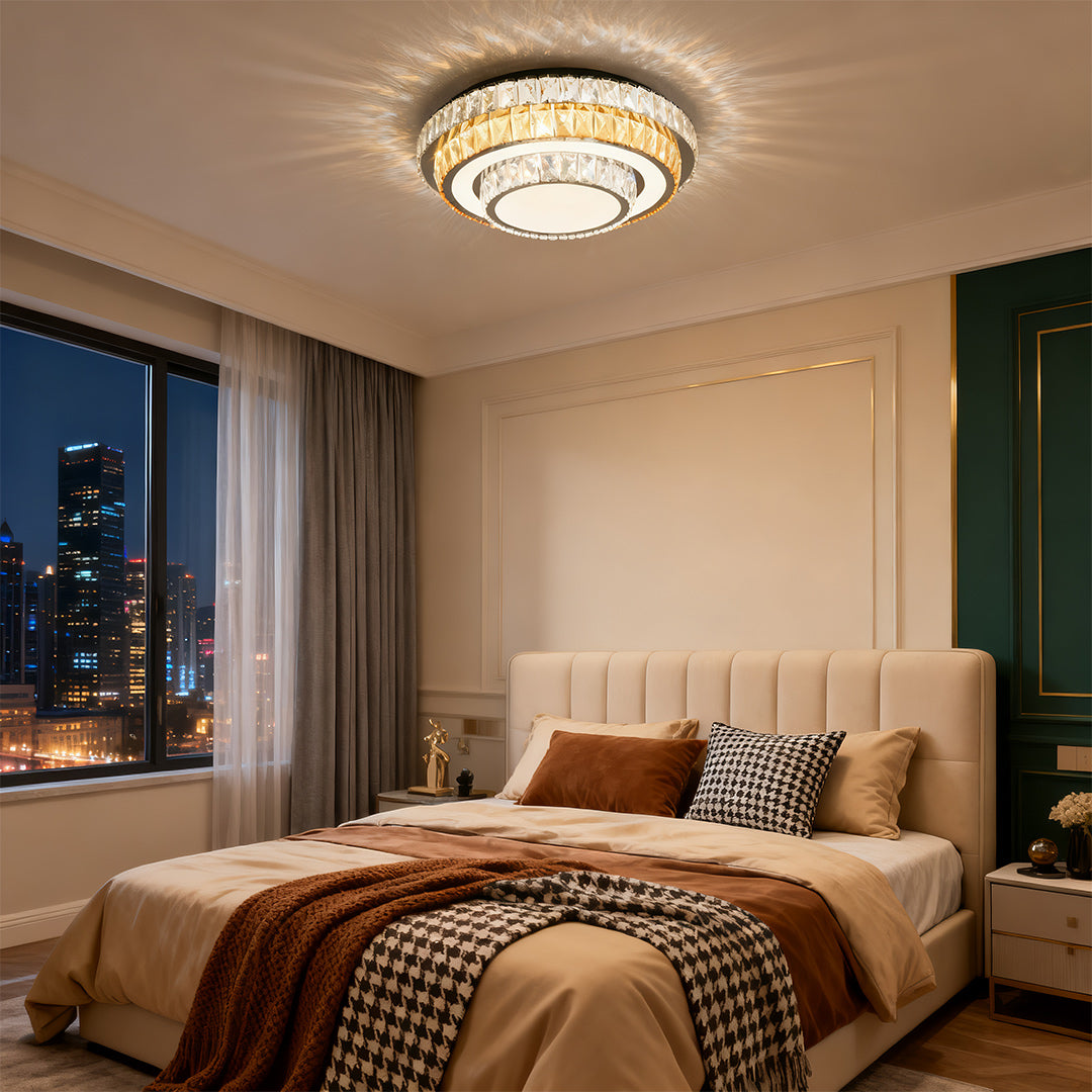 Round modern flush mount light fixture shining warmly in a cozy bedroom interior.