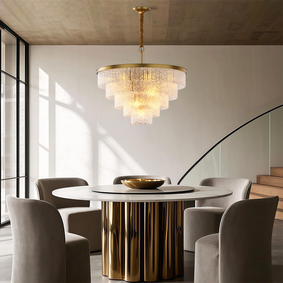 Luxury modern forms chandelier inspired round modern chandelier above dining table with black chairs.