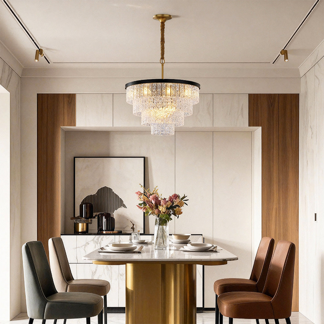 Luxury modern forms chandelier inspired round modern chandelier in transitional dining space with upholstered chairs.