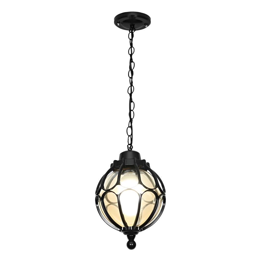 Round outdoor hanging lights with a black finish, hanging above an outdoor dining table.
