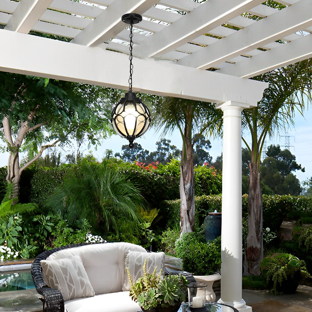 Round outdoor hanging lights with a black metal frame, installed under a pergola.