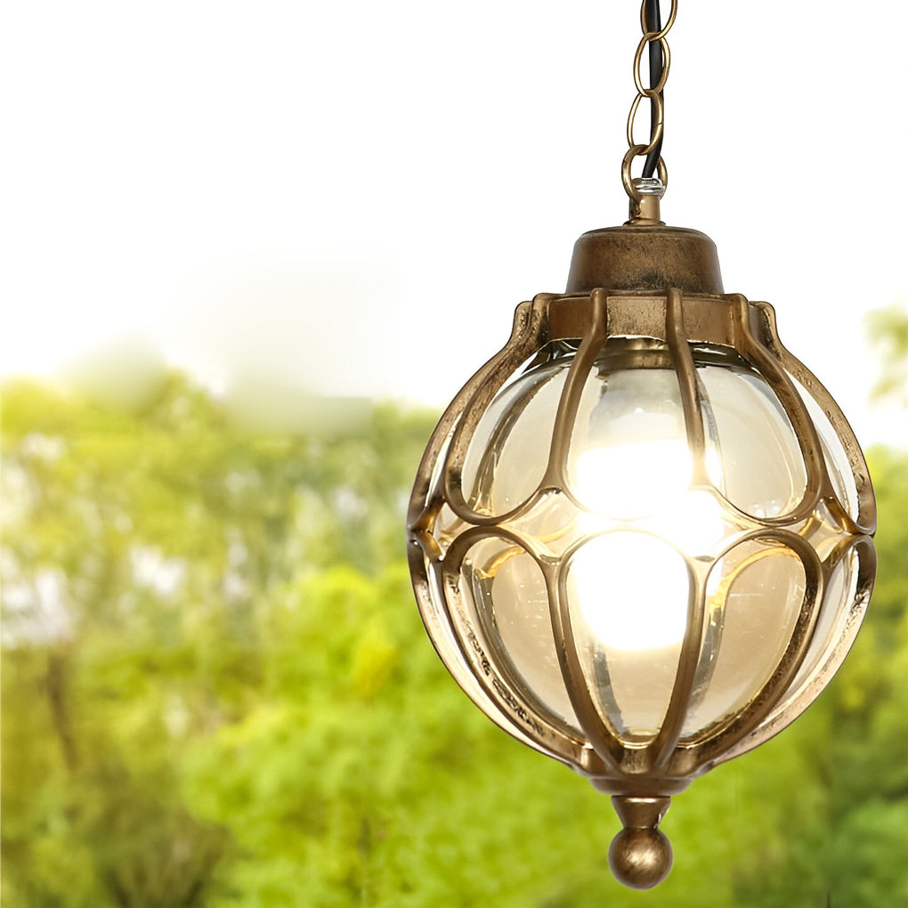 Round outdoor hanging lights with a classic design, glowing softly in an outdoor space.
