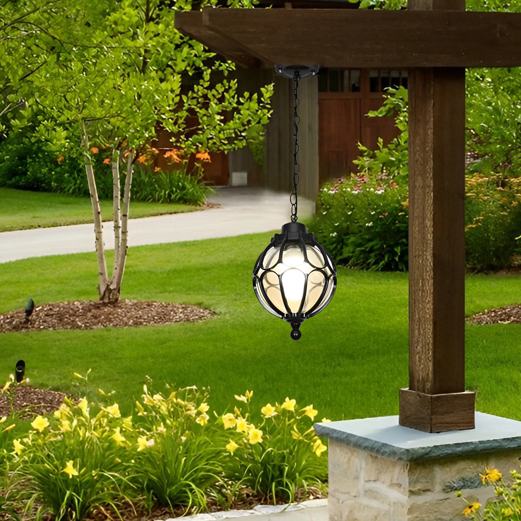 Round outdoor hanging lights with a rustic design, hanging from a wooden beam.