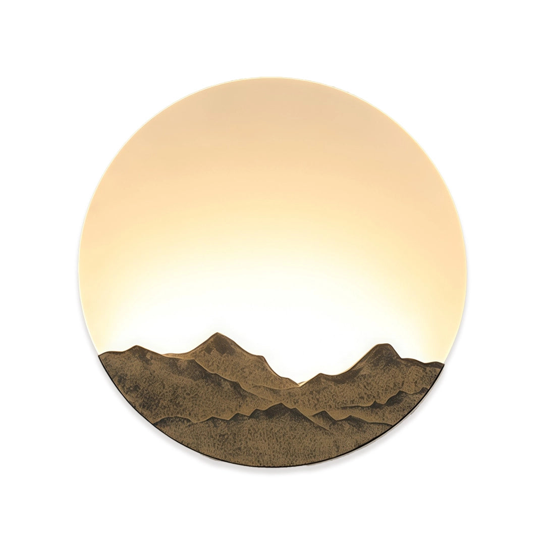 Round outdoor sconce with a glowing circular panel and mountain design on a white background.