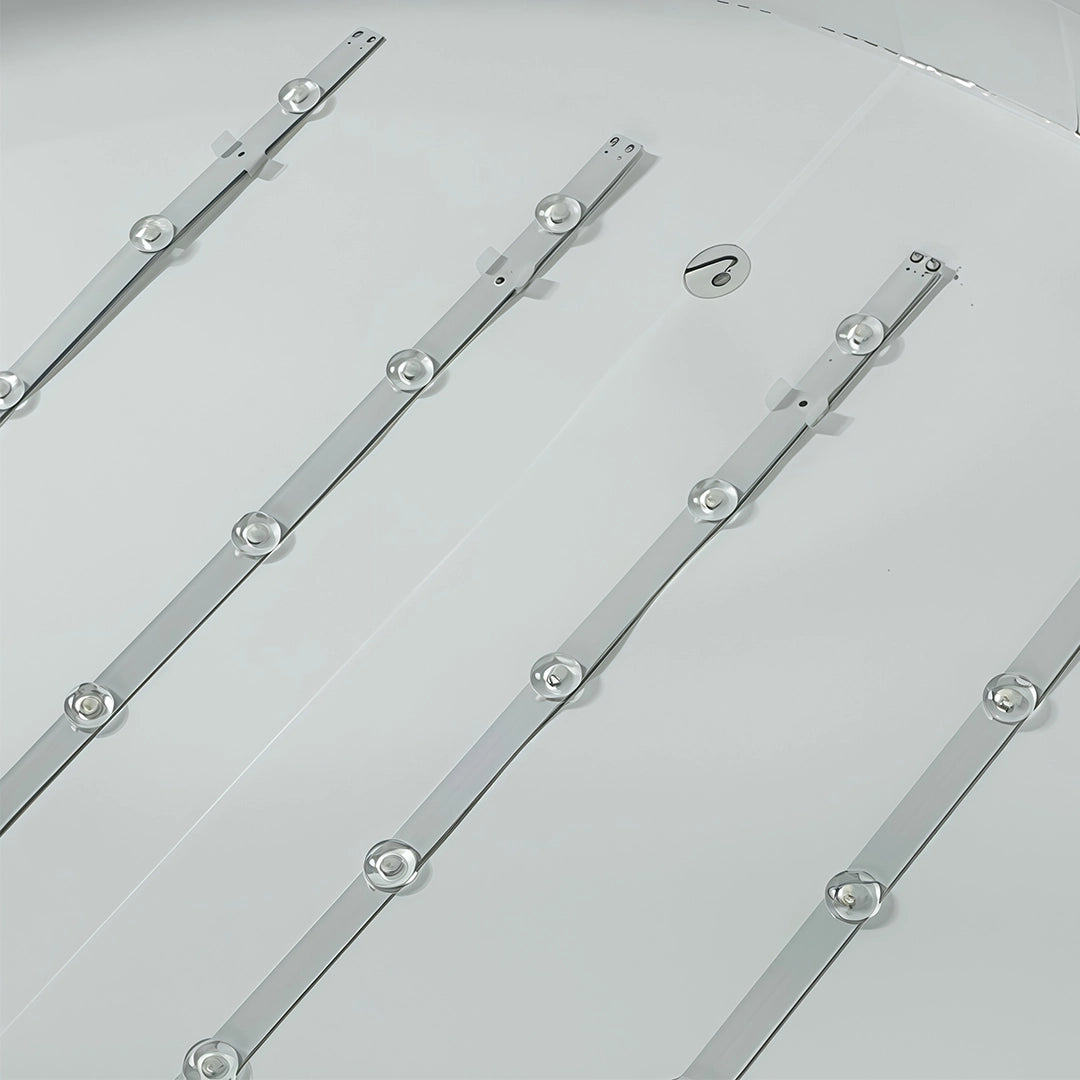 Close-up of hanging cable strands and crystal accents on round pendant lights.