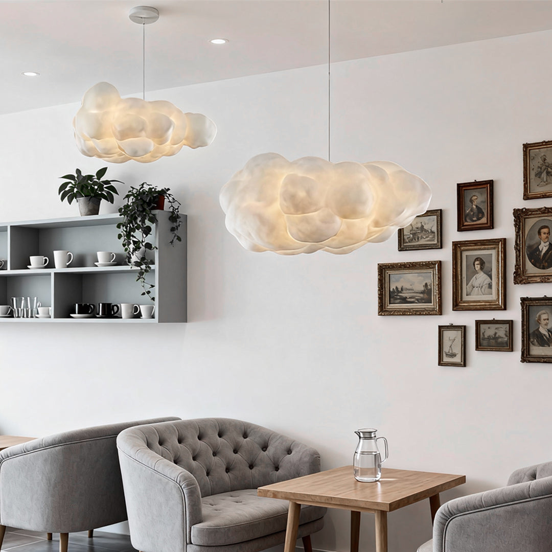 Rounded cloud pendant light displayed with soft warm illumination living room.