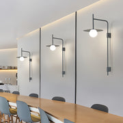 Row of LED light wall lamps in contemporary restaurant setting with modern seating and stylish interior