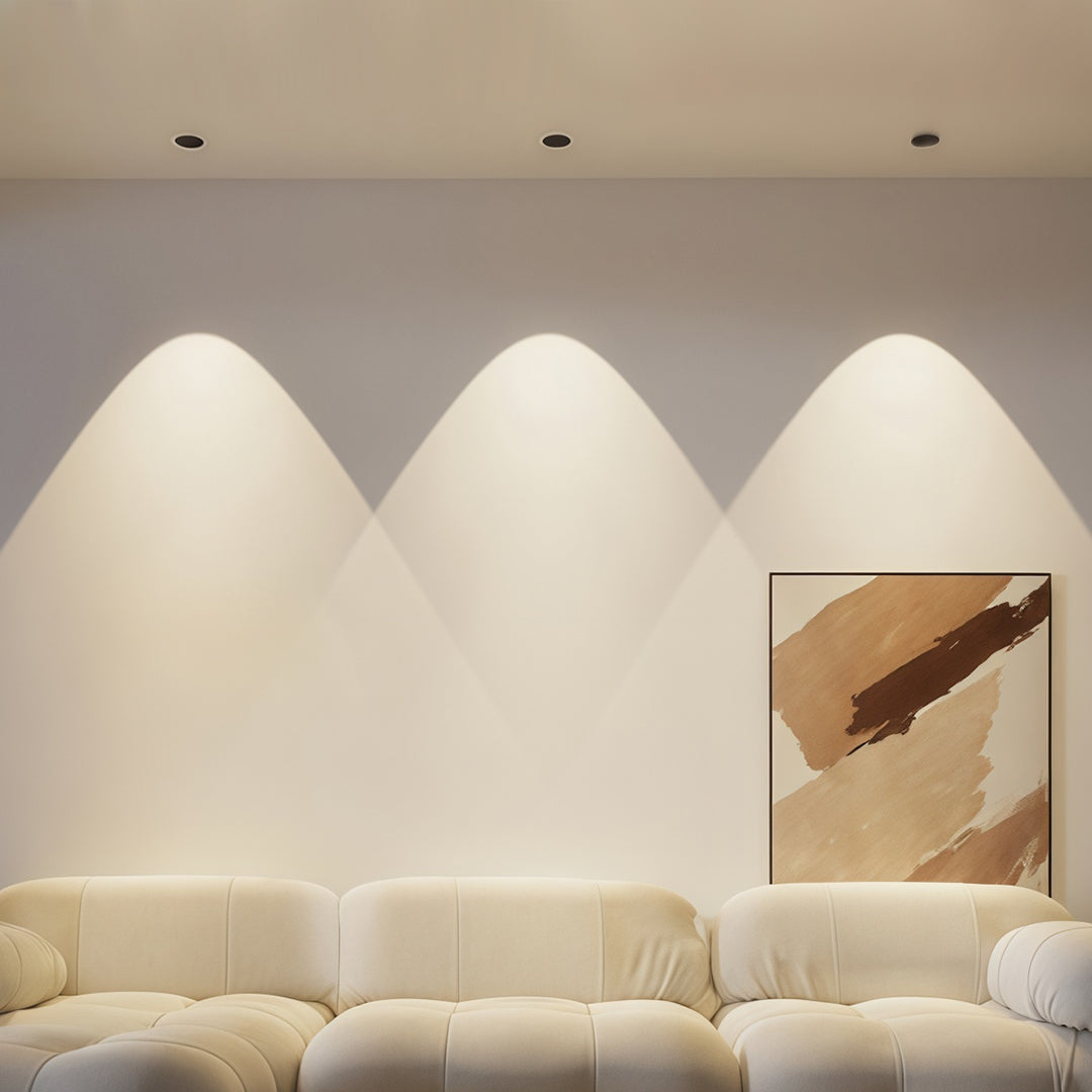 Row of spotlights for house providing wall washing effect in minimalist space with decorative wave pattern