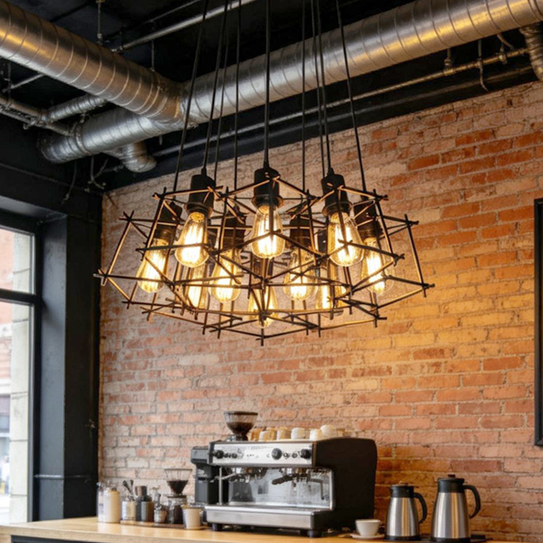 Rustic cafe space featuring a black iron cage pendant light against a brick wall background.