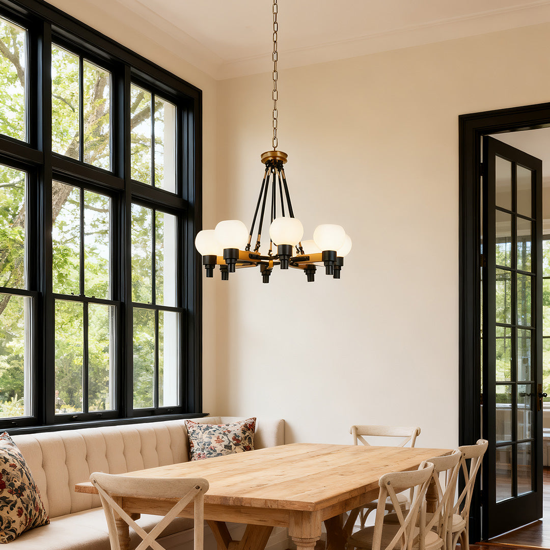 8 light chandeliers with a dark bronze geometric frame and candle-style bulbs, shown in a rustic dining room setting.