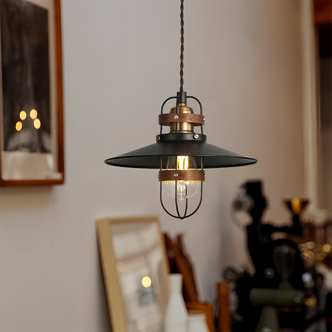 Rustic metal cage vintage hanging pendant lights illuminating a cozy cafe interior 