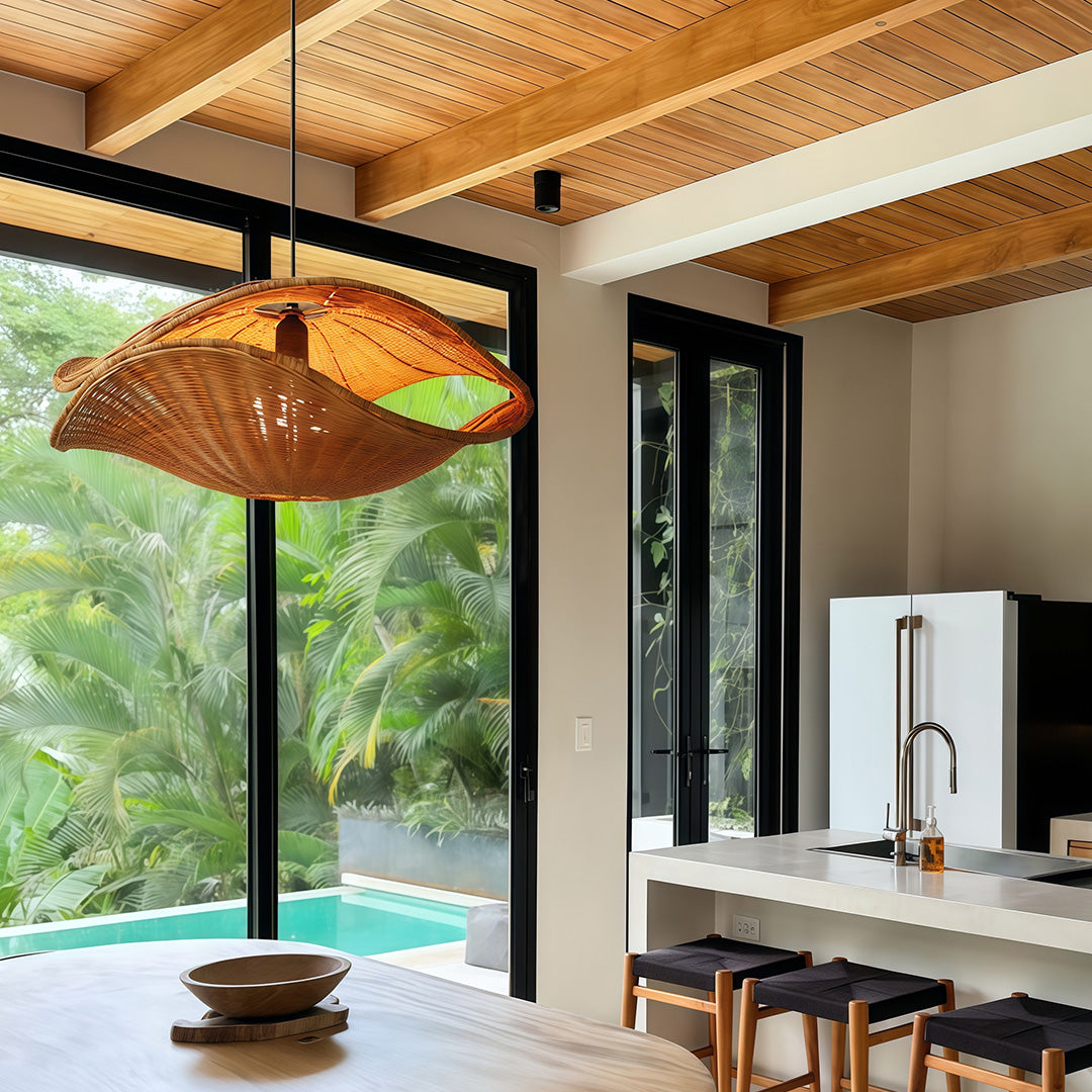 Rattan pendant light fixture adding rustic charm to a dining room, blending natural materials with modern design.