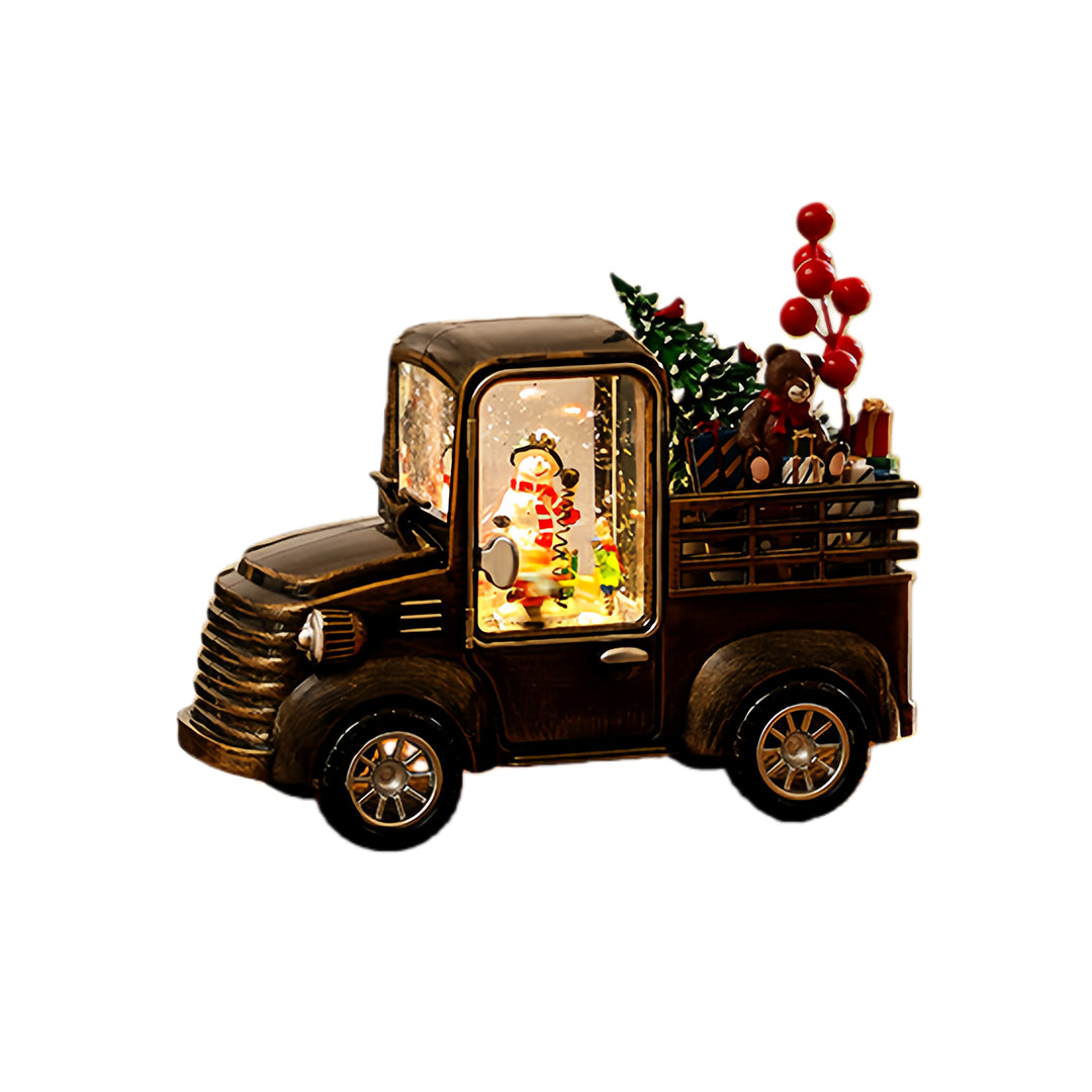 Rustic bronze truck ornament with glowing Christmas display, offering a warm modern gold table lamp ambiance.