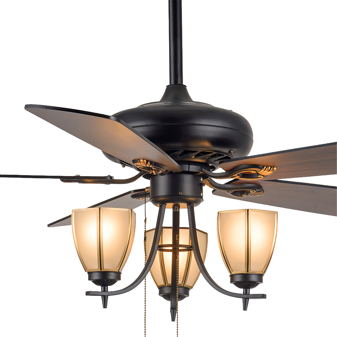 Rustic vintage style ceiling fan with lights displaying five reversible blades and three decorative glass fixtures with pull chains.