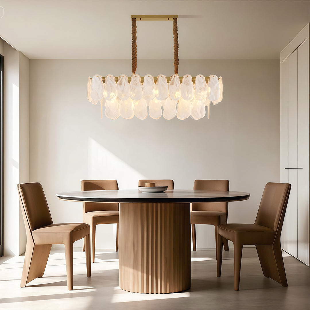 Midcentury modern chandelier featuring satin nickel with geometric frosted glass arrangement.