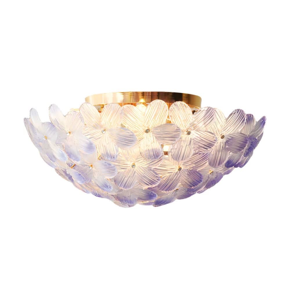 This ceiling light combines vintage French elegance with contemporary craftsmanship, using glass petals to reflect light beautifully and enhance your home’s ambiance.