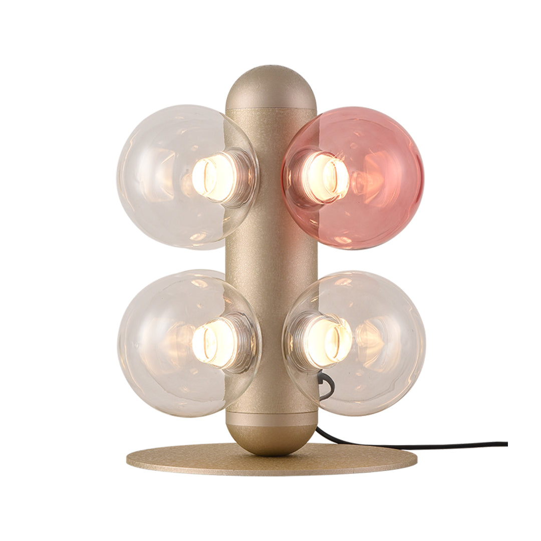 Sculptural bubble table lamp creating artistic illumination with multiple glass sphere arrangement