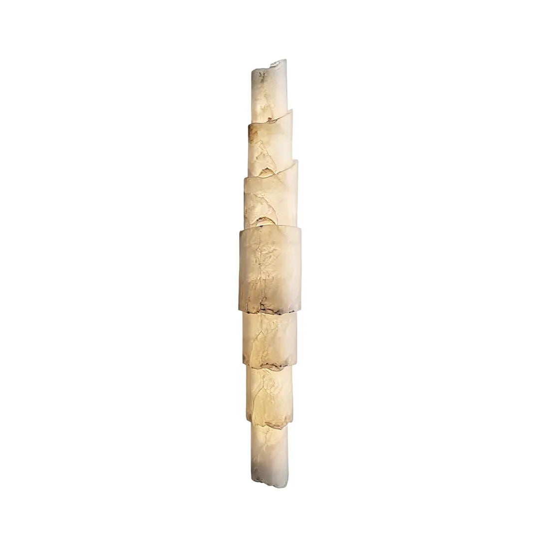 Sculptural wall sconce product image featuring stacked alabaster-style panels and warm integrated lighting.