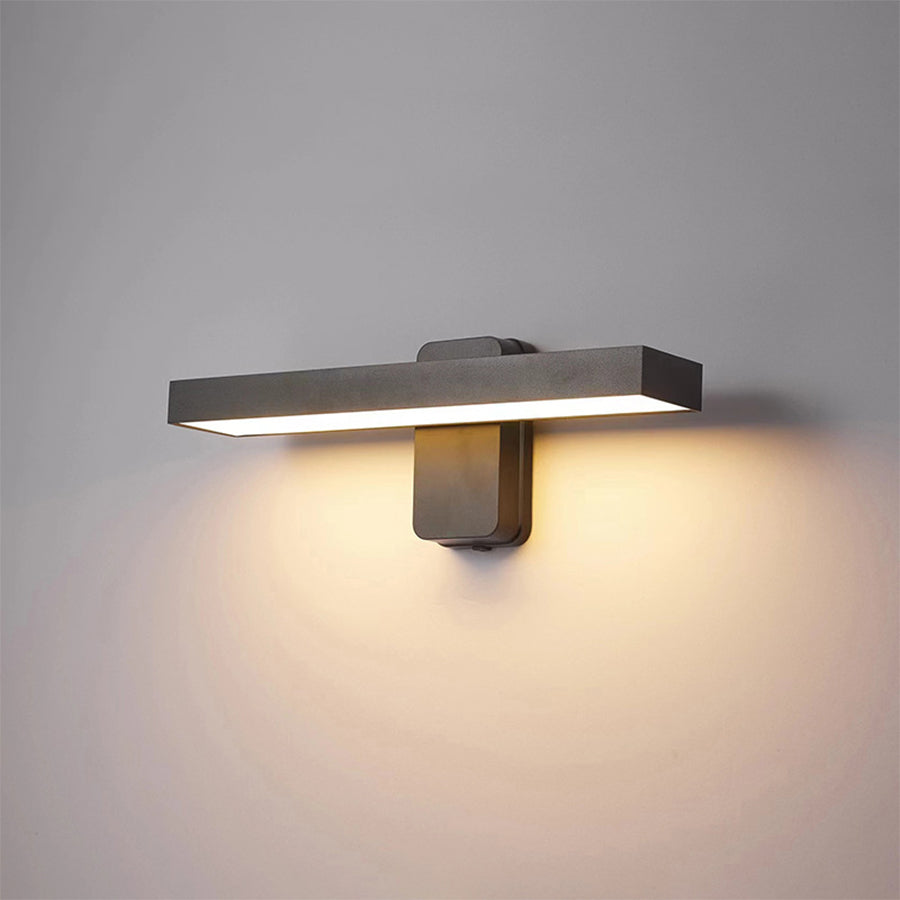 Sculptural wall sconce with clean lines creating sophisticated interior lighting accent