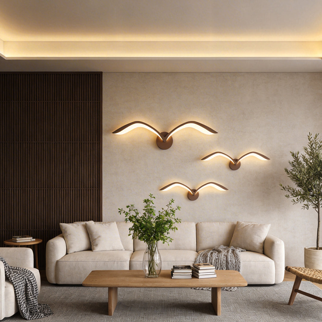 Seagull lighting sconces with a sleek design, enhancing a contemporary living room.