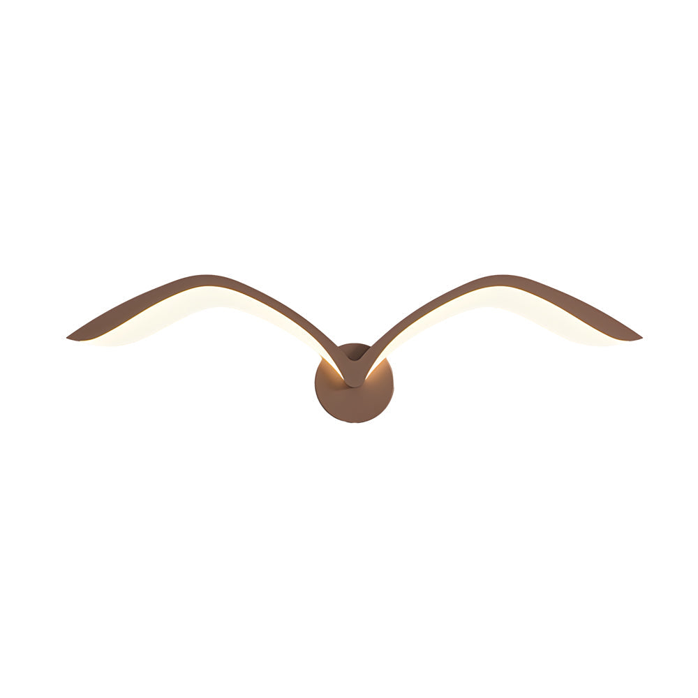 Seagull lighting sconces with a sleek design, providing soft light in a living room.