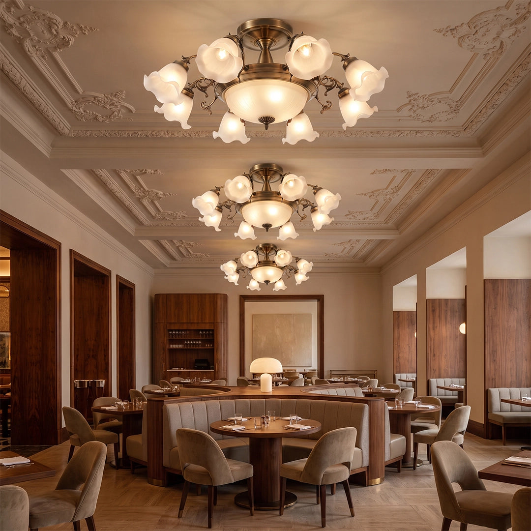 Semi flush glass ceiling lights installed along an elegant dining room with ornate ceiling details and warm wood accents.