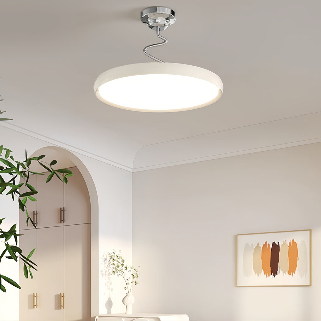 Close-up detail of modern semi flush mount ceiling light showing smooth diffuser and edge design